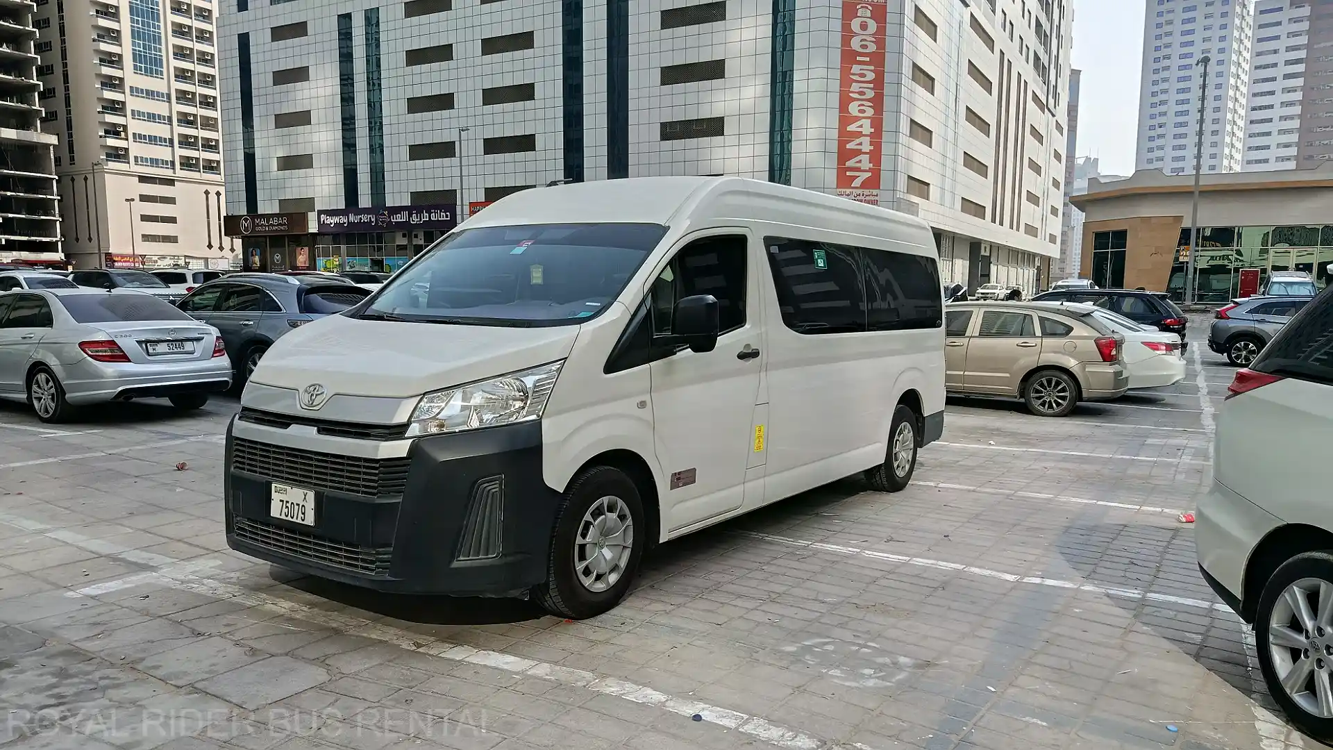13 seater Toyota Hiace van rental Dubai with driver