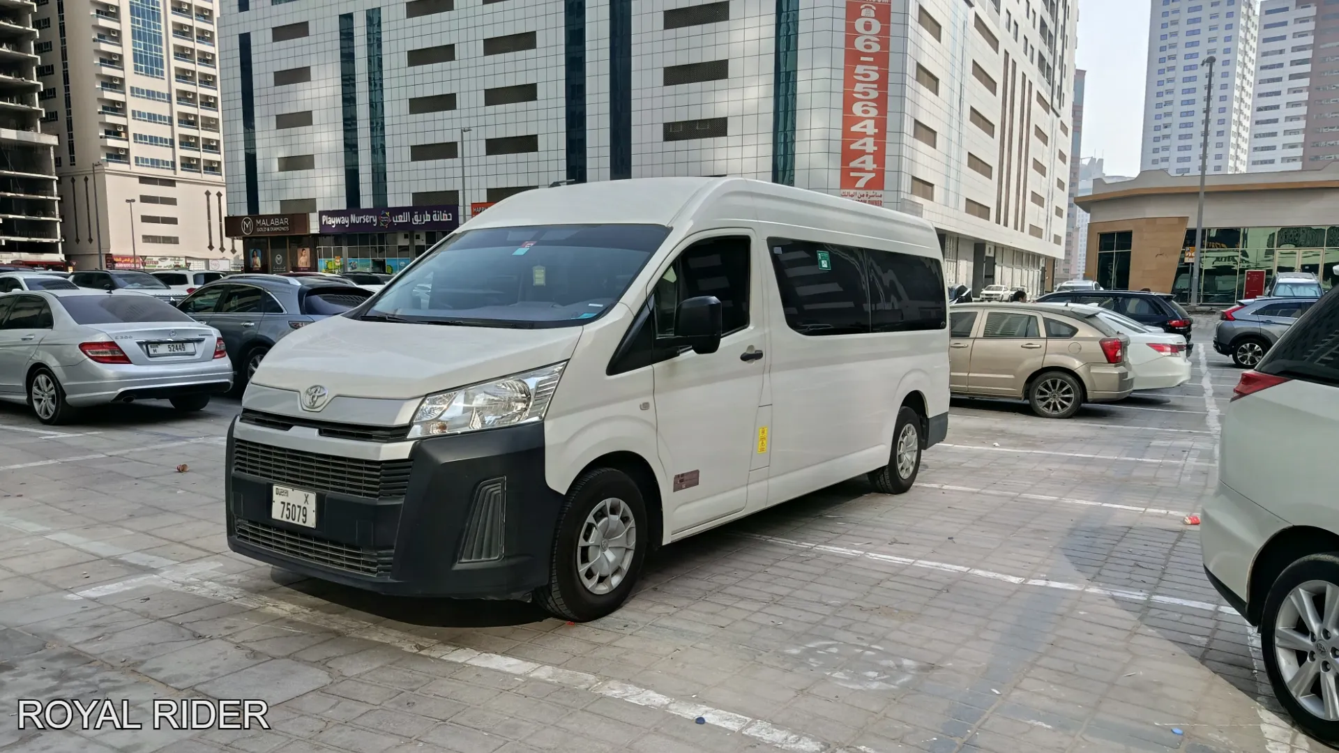 13 seater van hire Abu Dhabi passenger transport