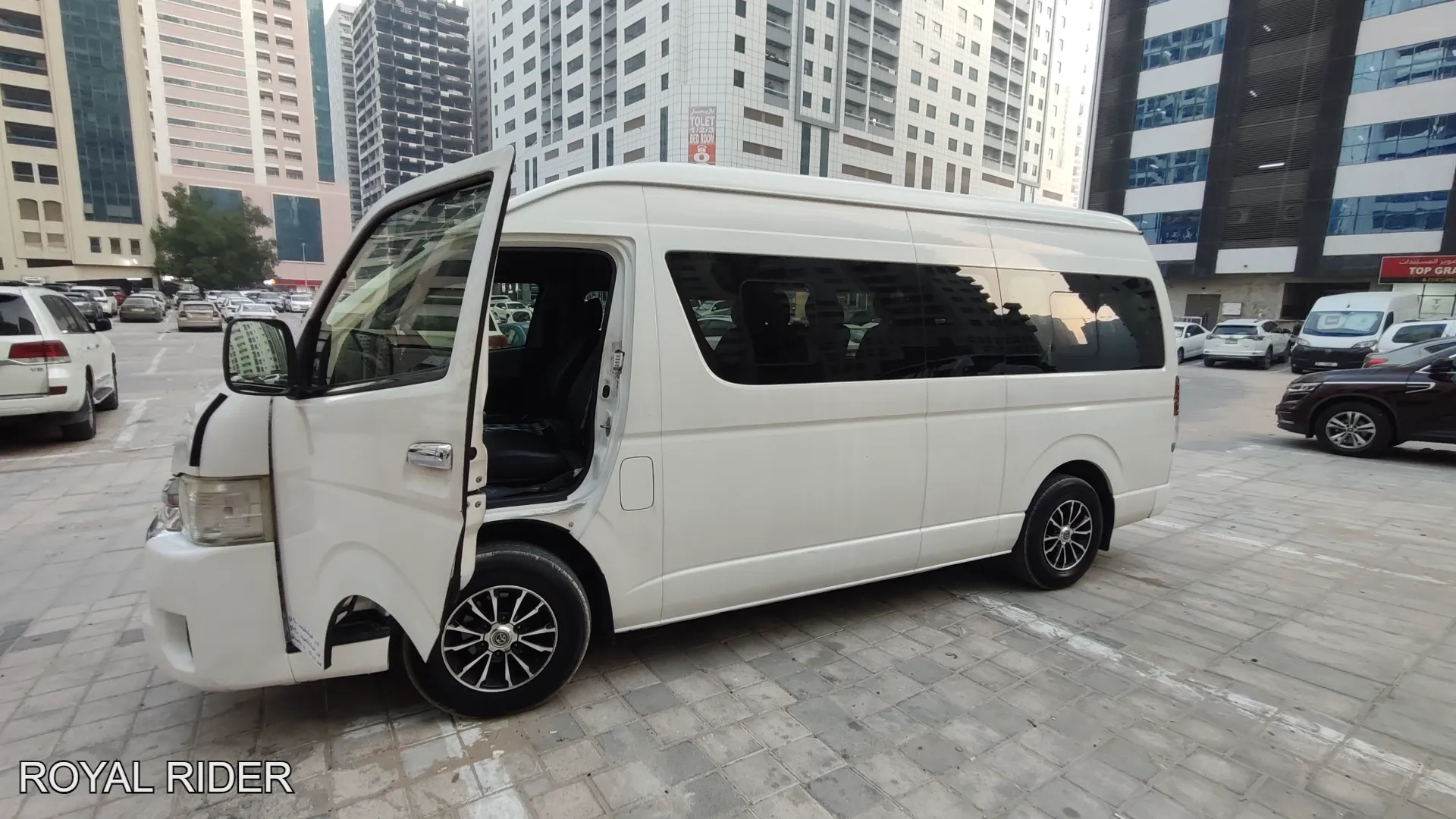 14 seater van rental Sharjah with driver