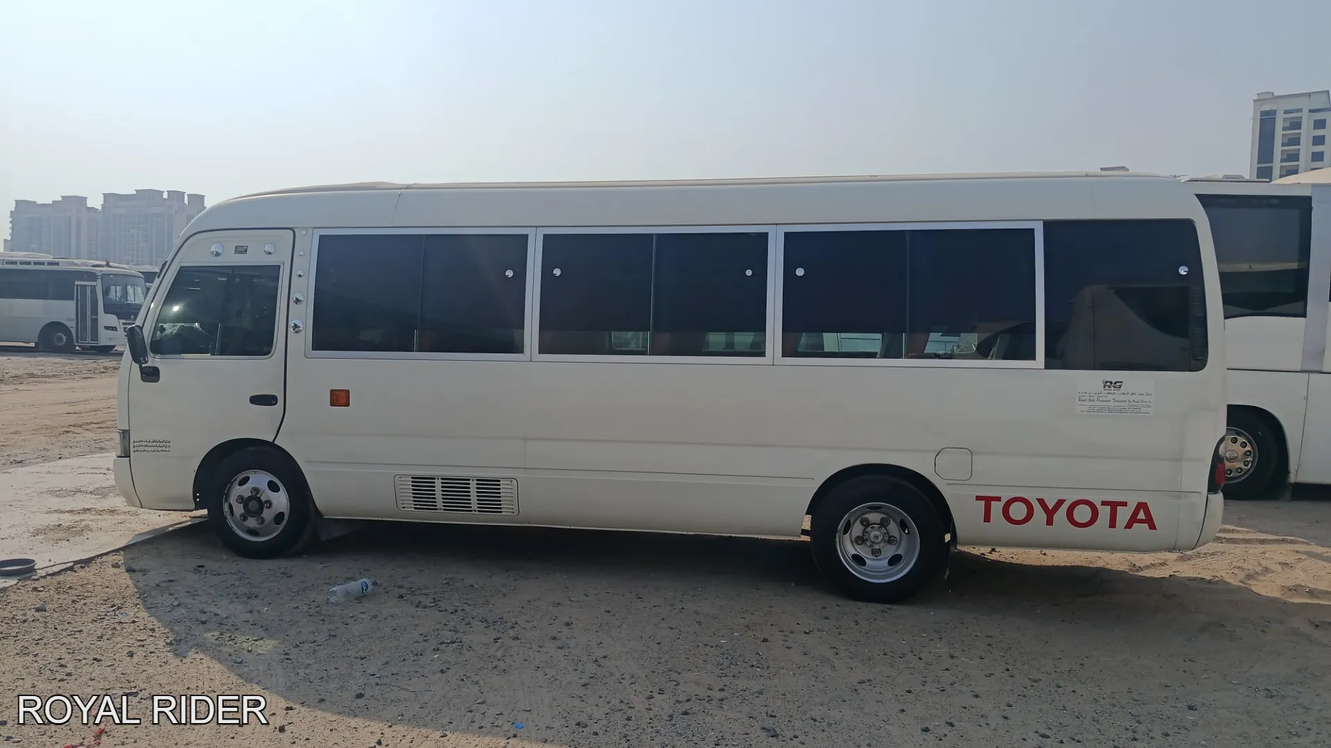 30 seater Toyota Coaster bus rental Dubai with driver