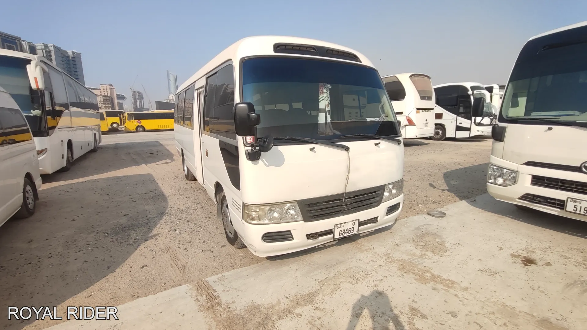 Toyota Coaster minibus rental Ajman