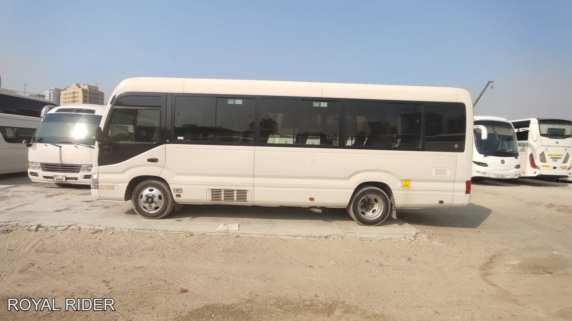 Luxury mini bus rental Umm Al Quwain for private groups