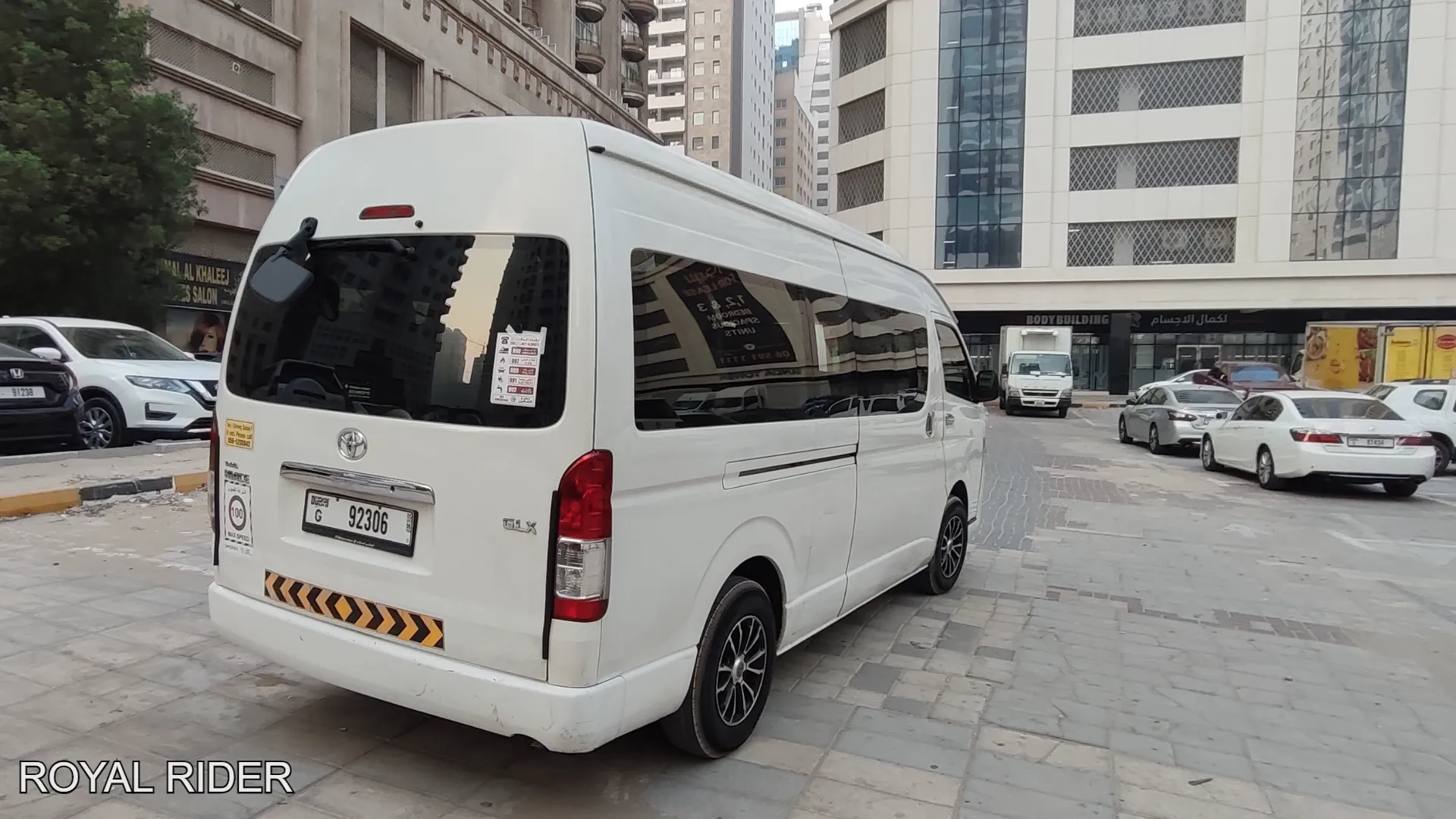 10 to 12 seater minivan rental Al Ain with driver