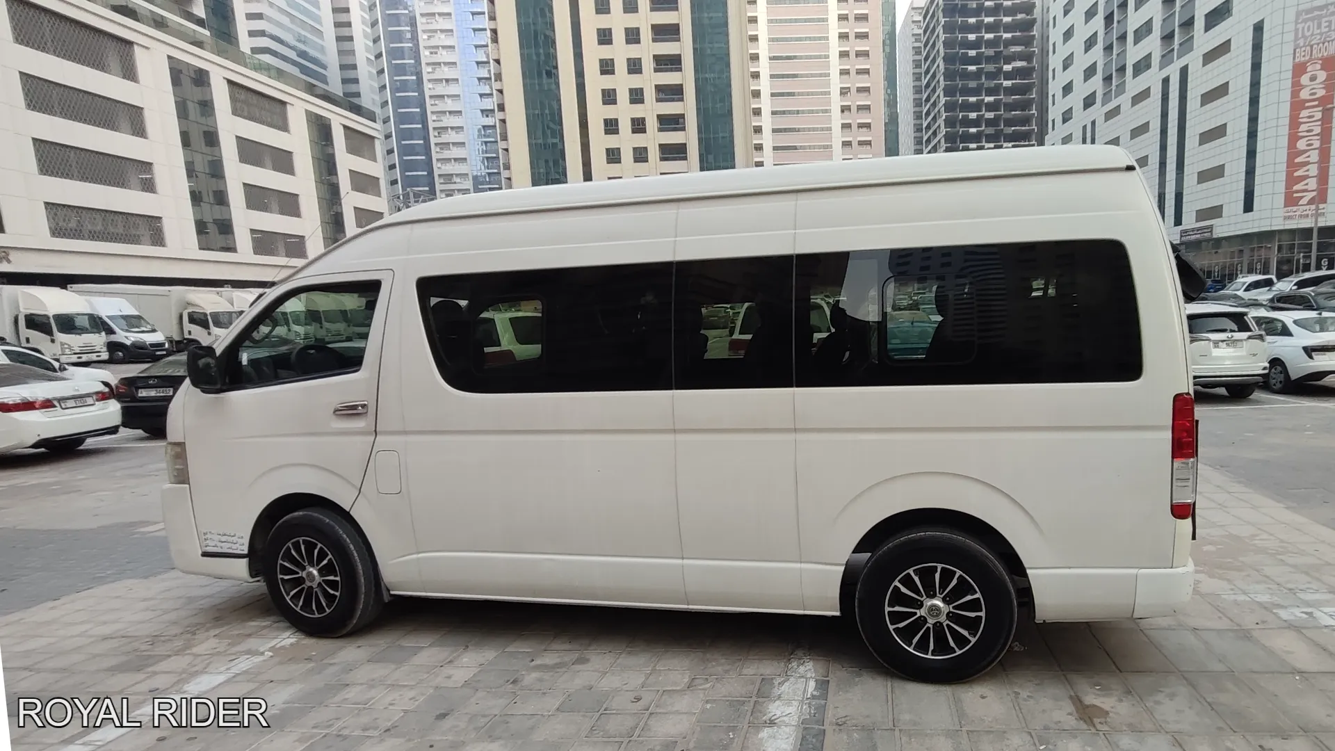 7 to 8 seater van with driver Al Ain