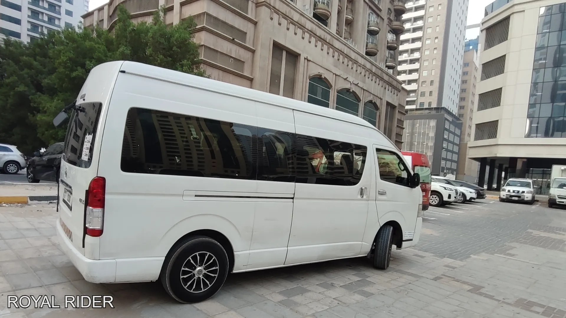 10 to 12 seater van with driver Hatta